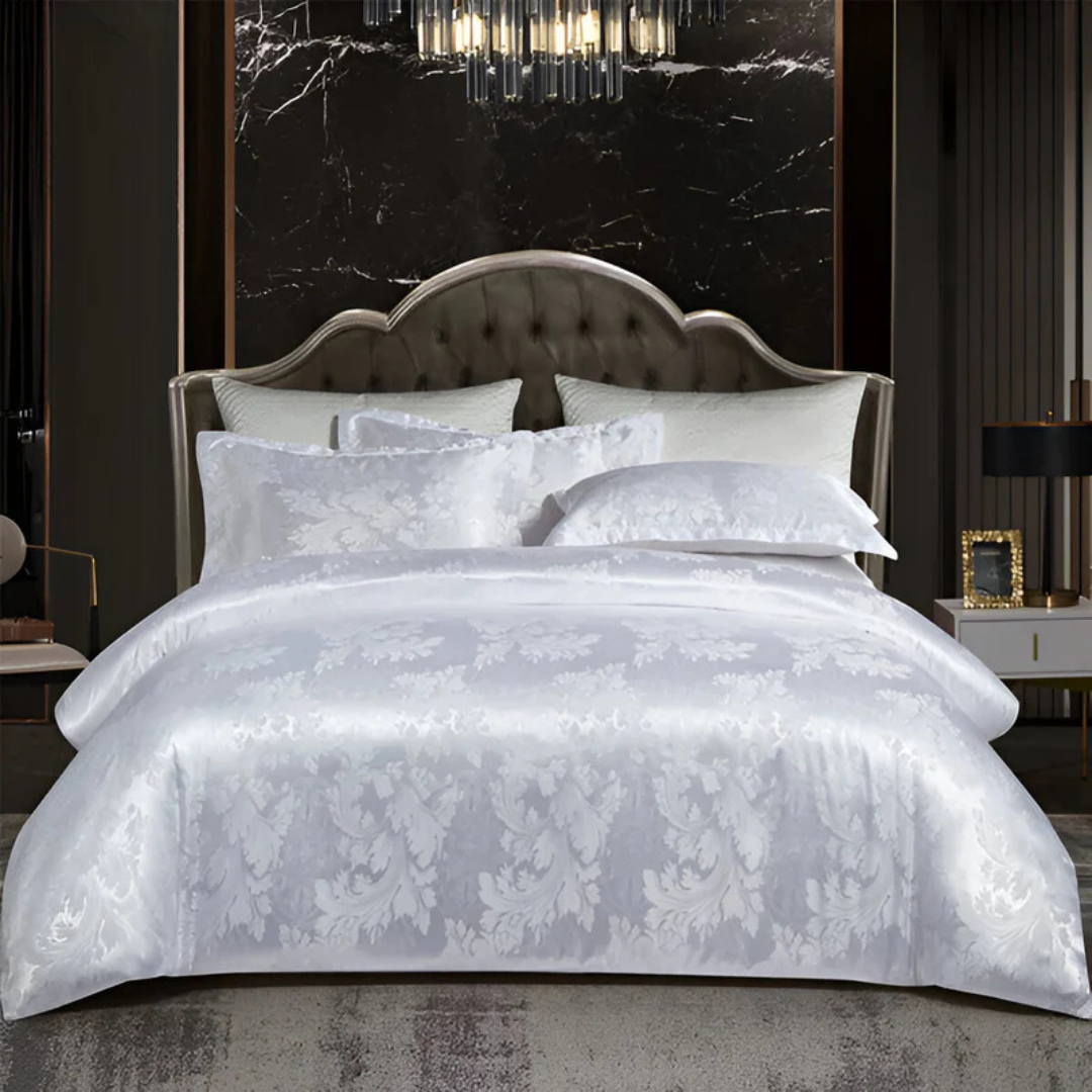 Ylellinen satiininen päiväpeitteen päällinen setti elegantilla kukkakuvioinnilla täydelliseen makuuhuoneen mukavuuteen ja tyyliin